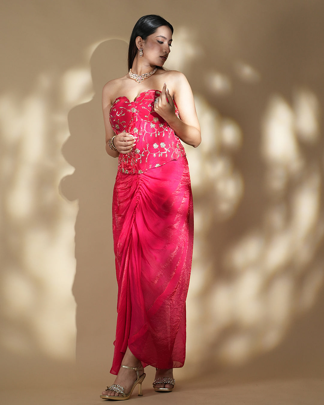 Hot pink embroidered drape gown with corset blouse