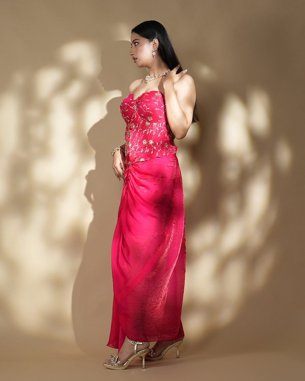 Designer hot pink drape gown elegant front view