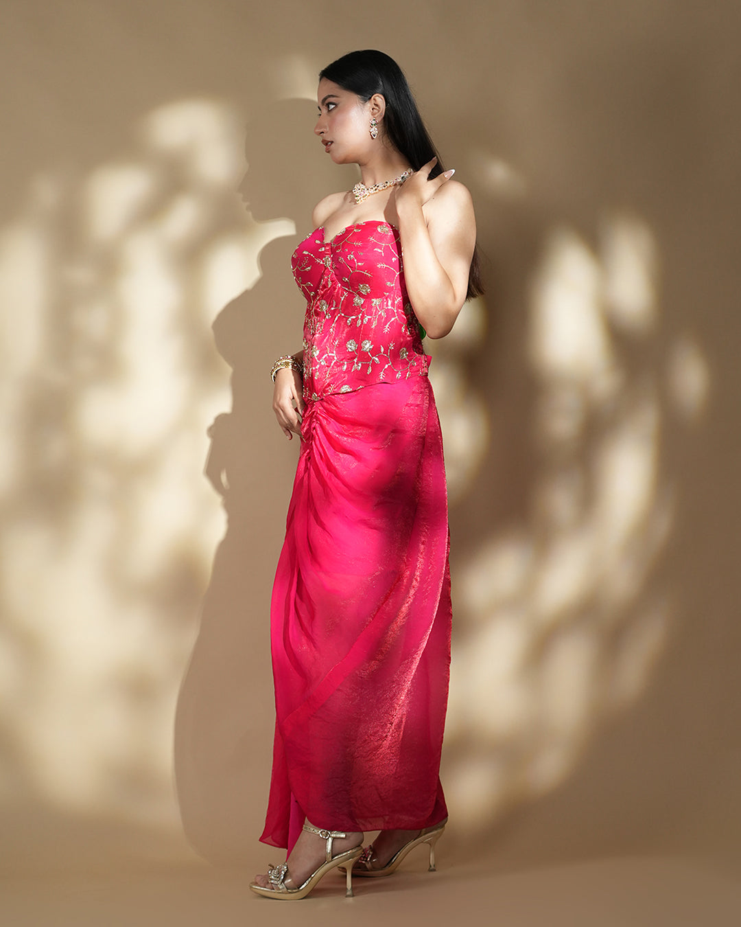Designer hot pink drape gown elegant front view