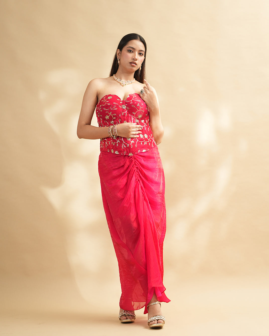 Hot pink embroidered corset gown side profile view