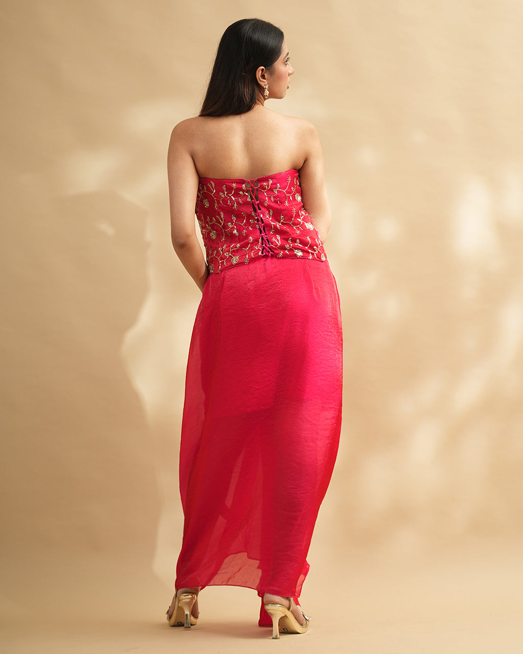 Hot pink draped gown with embellished corset back