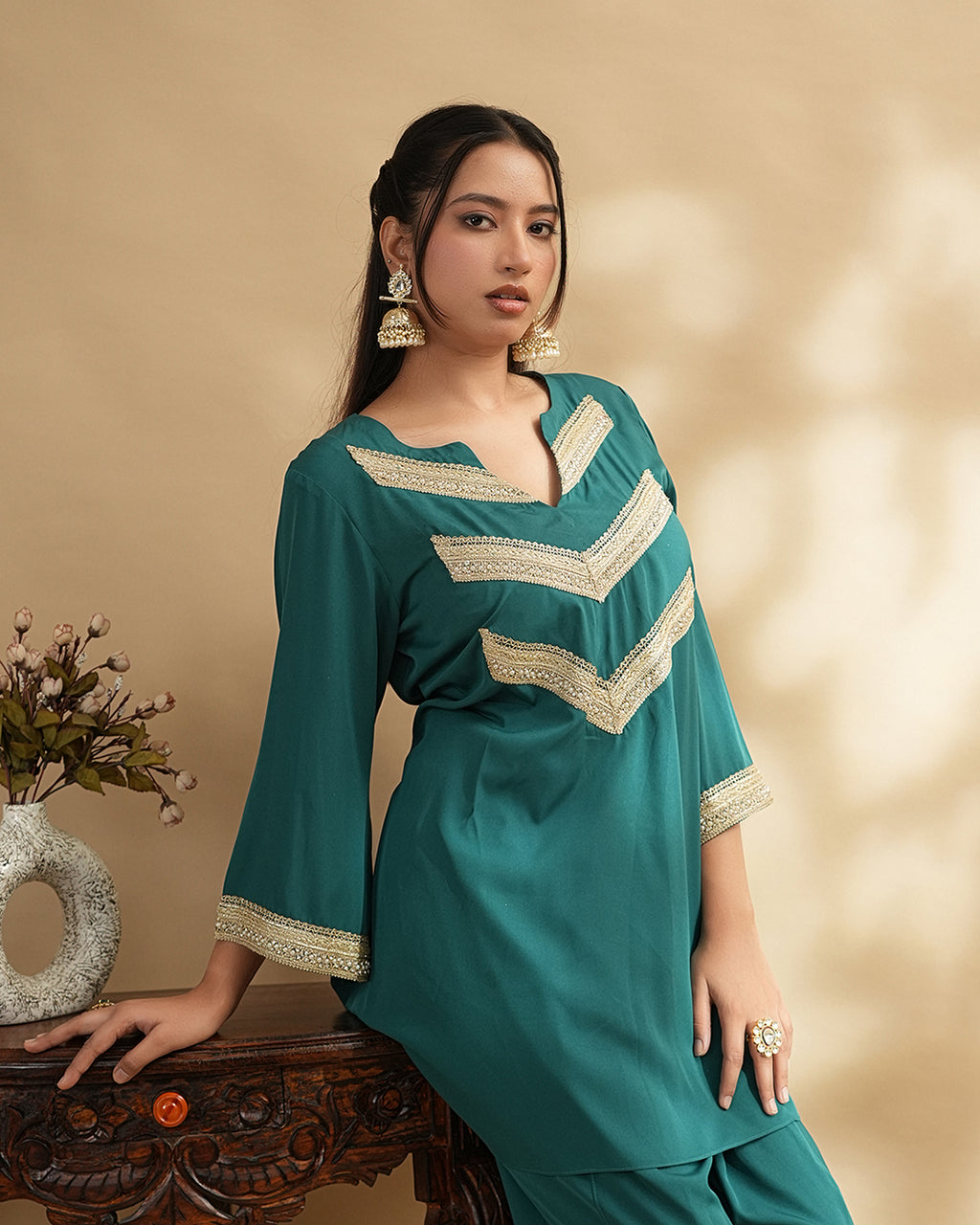 Teal embellished kurta festive outfit shown from front