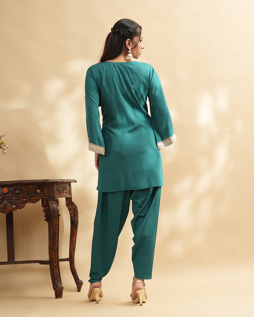 Teal green kurta set elegant back view women